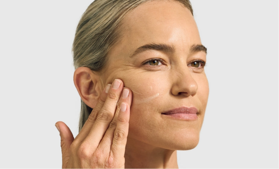 Woman applying Pai night cream