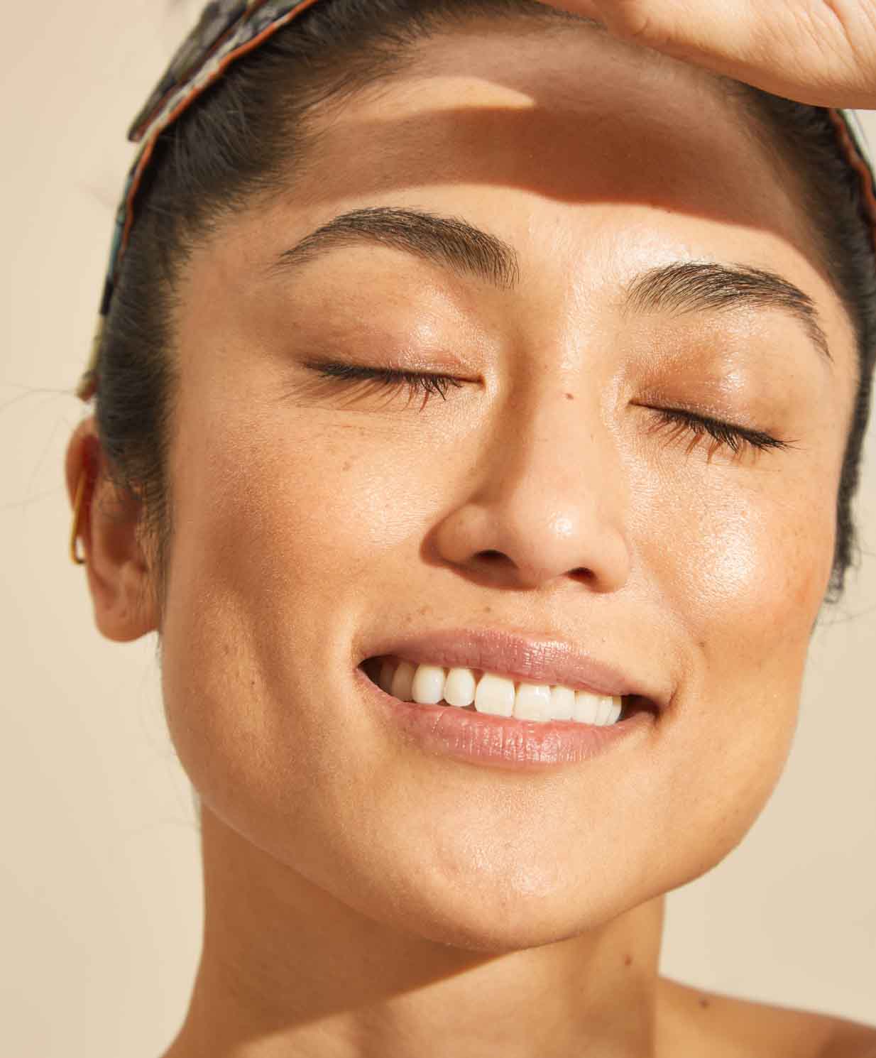 woman wearing glow drops